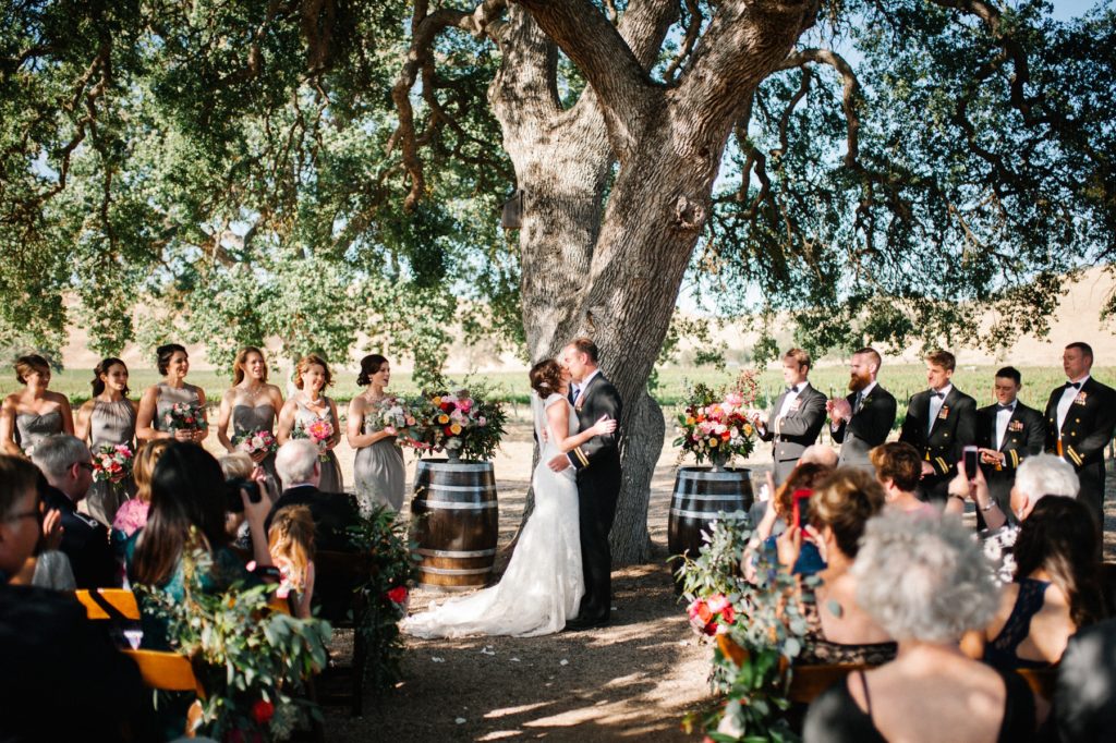 Bride and Groom First Kiss during Ceremony at Cass Winery Wedding photographed by Austyn Elizabeth Photography