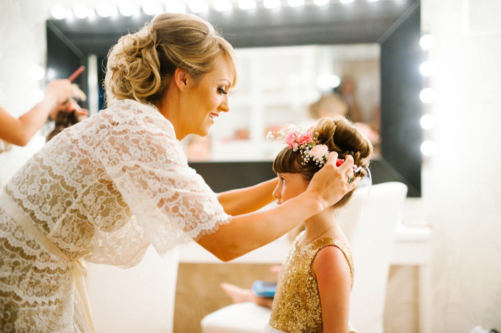 Crowning the flower girl at a romantic destination Caribbean wedding at Jellyfish Restaurant in Punta Cana, Dominican Republic by Colorado wedding photographer Candice Benjamin Photography, assisted by San Luis Obispo wedding photographer Austyn Elizabeth Photography.