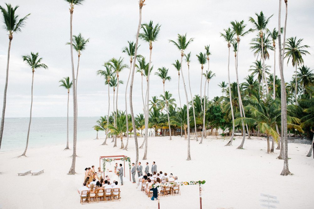 Wedding ceremony at a romantic destination Caribbean wedding at Jellyfish Restaurant in Punta Cana, Dominican Republic by Colorado wedding photographer Candice Benjamin Photography, assisted by San Luis Obispo wedding photographer Austyn Elizabeth Photography.
