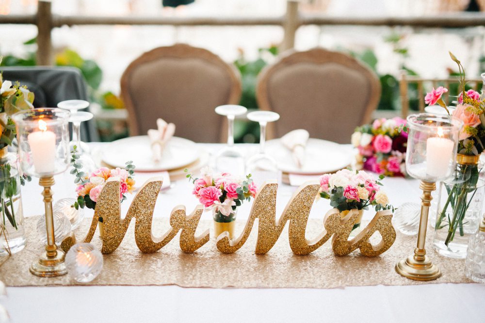 Gold Mr and Mrs signs at a romantic destination Caribbean wedding at Jellyfish Restaurant in Punta Cana, Dominican Republic by Colorado wedding photographer Candice Benjamin Photography, assisted by San Luis Obispo wedding photographer Austyn Elizabeth Photography.