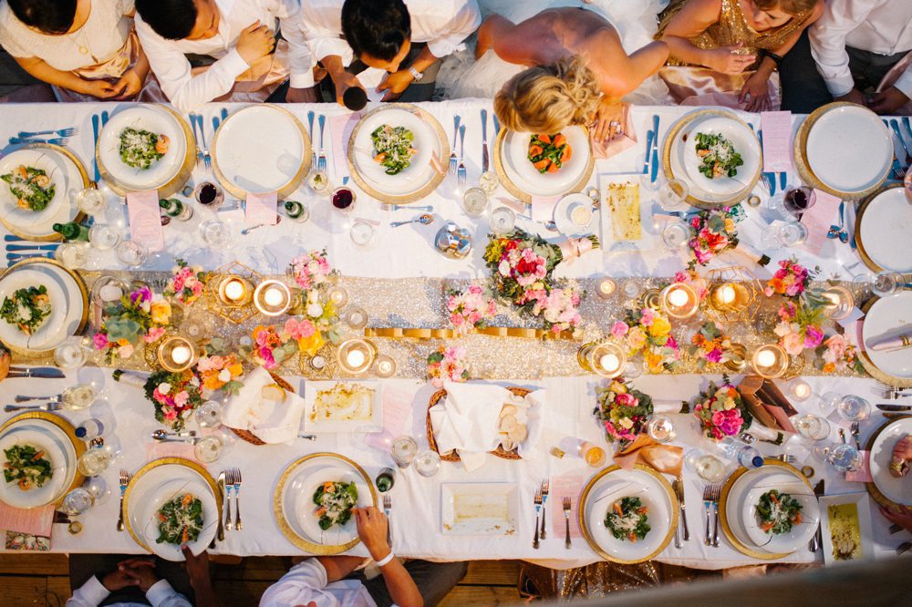Table overview at a romantic destination Caribbean wedding at Jellyfish Restaurant in Punta Cana, Dominican Republic by Colorado wedding photographer Candice Benjamin Photography, assisted by San Luis Obispo wedding photographer Austyn Elizabeth Photography.