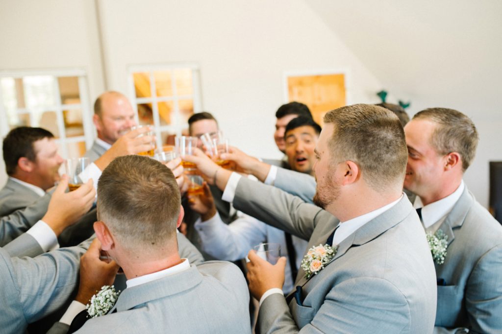 Grooms toasts at Spanish Oaks Wedding by San Luis Obispo Wedding Photographers Austyn Elizabeth Photography