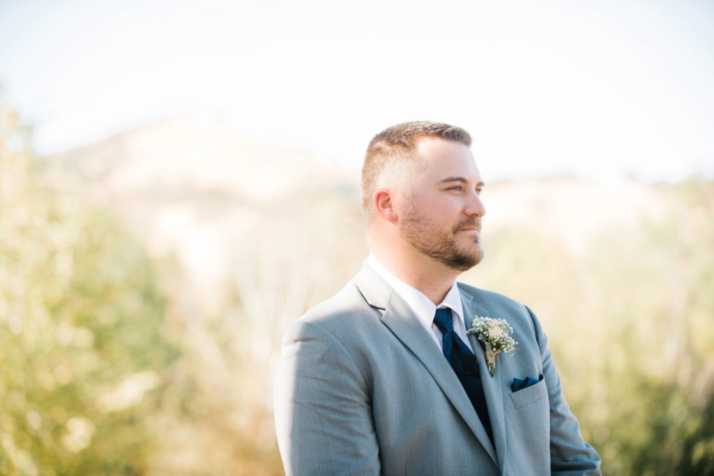 Groom waiting for brideat Spanish Oaks Wedding by San Luis Obispo Wedding Photographers Austyn Elizabeth Photography