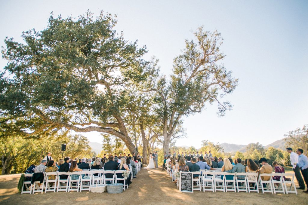 Wedding Ceremony by Oak Tree at Spanish Oaks Wedding by San Luis Obispo Wedding Photographers Austyn Elizabeth Photography