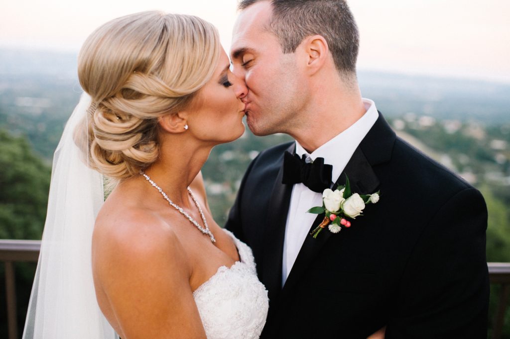 Bride and groom kiss at Mountain Winery Wedding in Saratoga Wedding by Austyn Elizabeth Photography