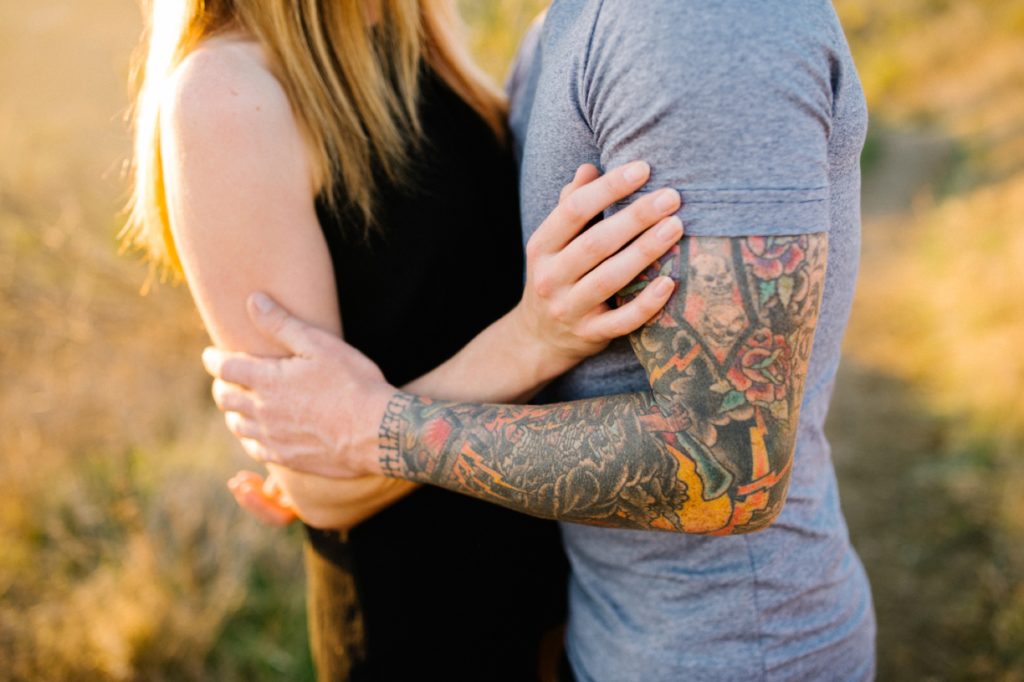 tattooed couple at Pirates Cove with Pismo Beach Engagement Photographer Austyn Elizabeth Photography