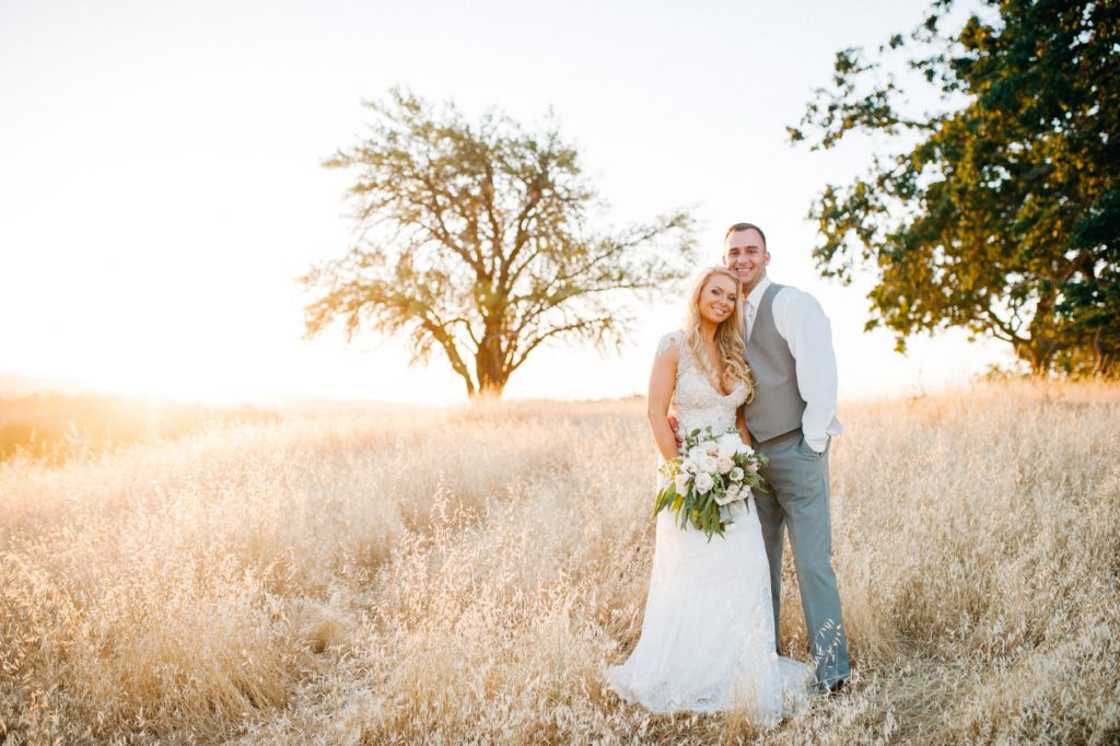Bride and Groom on Hill at Sunset at Grace Maralyn Estates and Garden Wedding by Austyn Elizabeth Photography