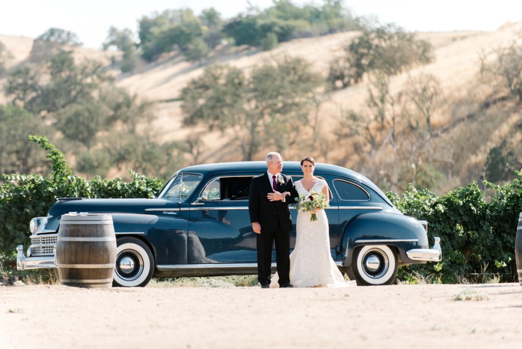 Bride walking down isle at cass winery wedding by paso robles wedding photographer Austyn Elizabeth Photography