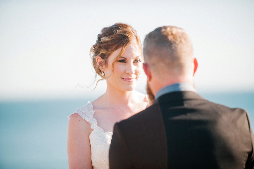 Stunning bride with makeup and hair by the queens bees at Pismo Beach Elopement by Austyn Elizabeth Photography