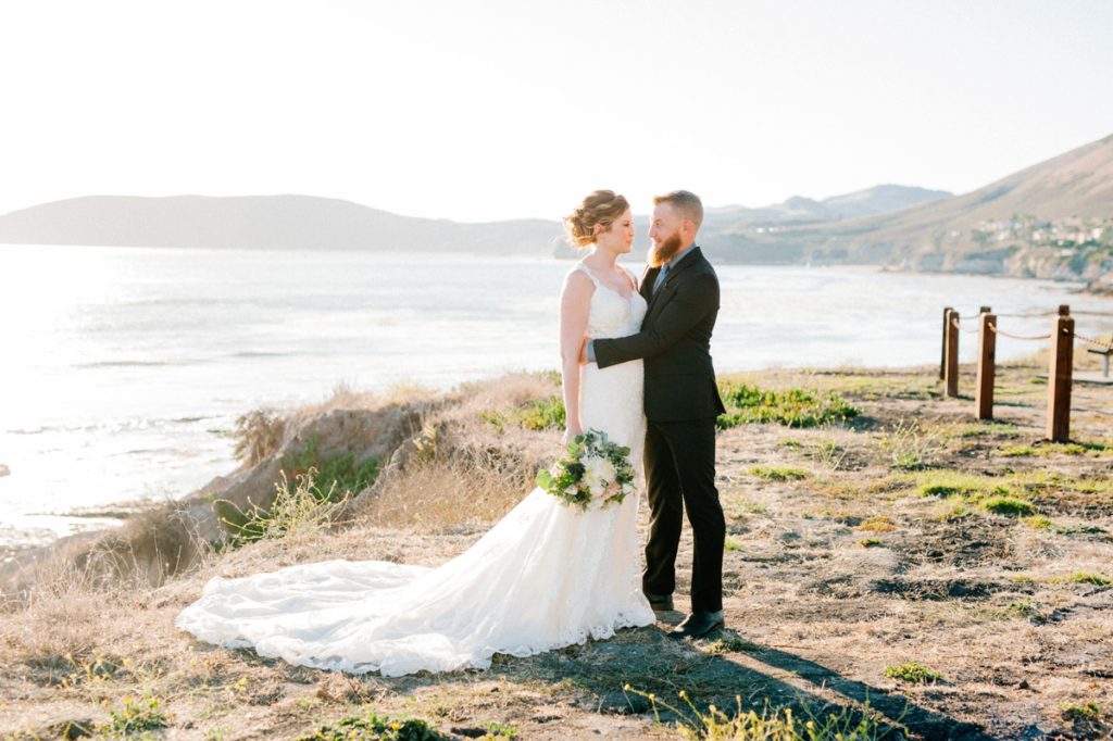 Bride and groom after wedding on Pismo Beach Cliffs Wedding for Pismo Beach Wedding Photographer Austyn Elizabeth Photography