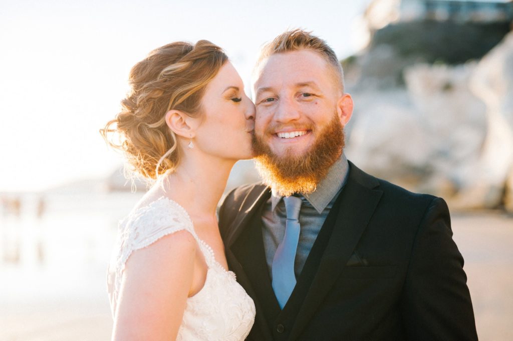 Bride and Groom during sunset on Pismo Beach for Wedding by Austyn Elizabeth Photography