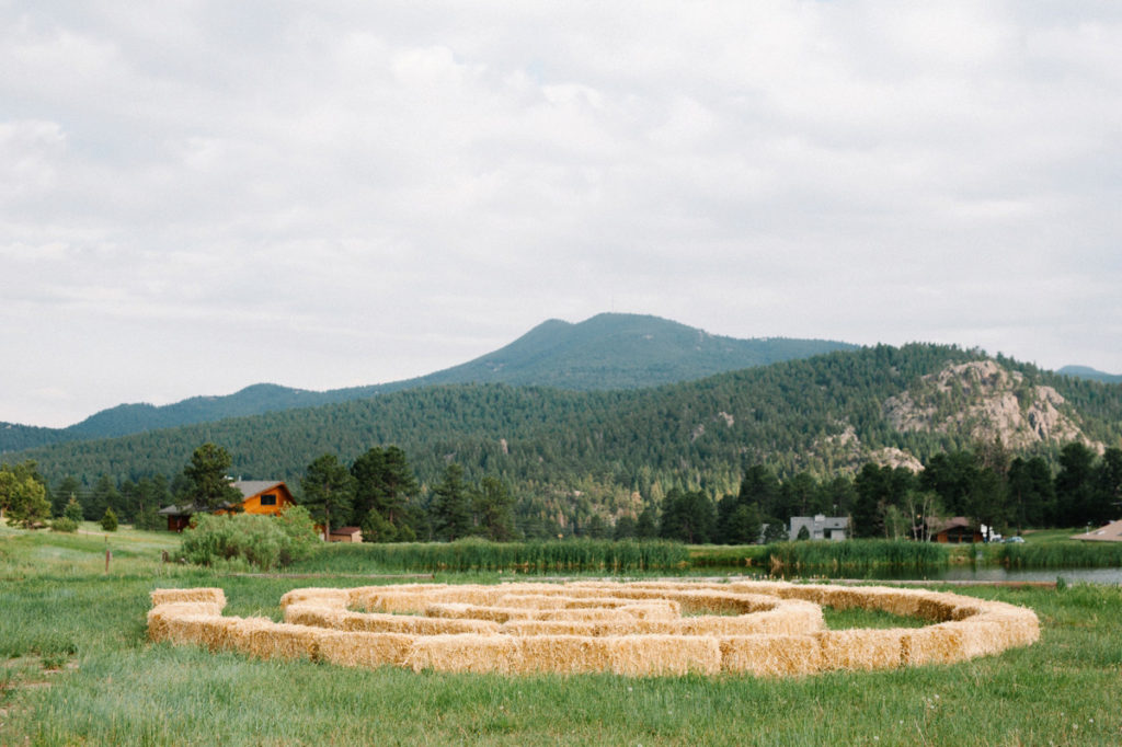 Ceremony in circle on hay bails at Evergreen Colorado Destination Wedding by San Luis Obispo Wedding Photographer Austyn Elizabeth Photography