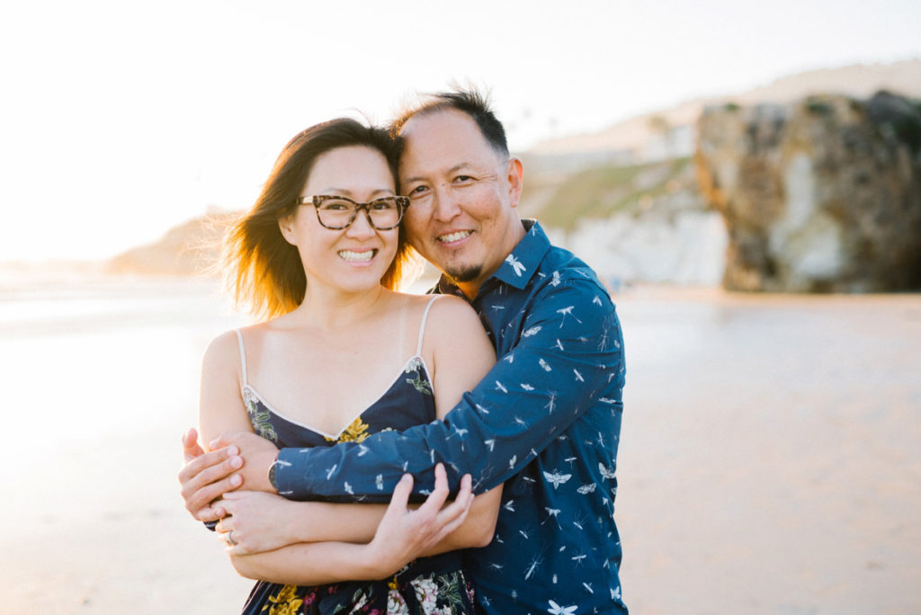 Husband and Wife pose on Pismo Beach with Arroyo Grande Family Photographer Austyn Elizabeth