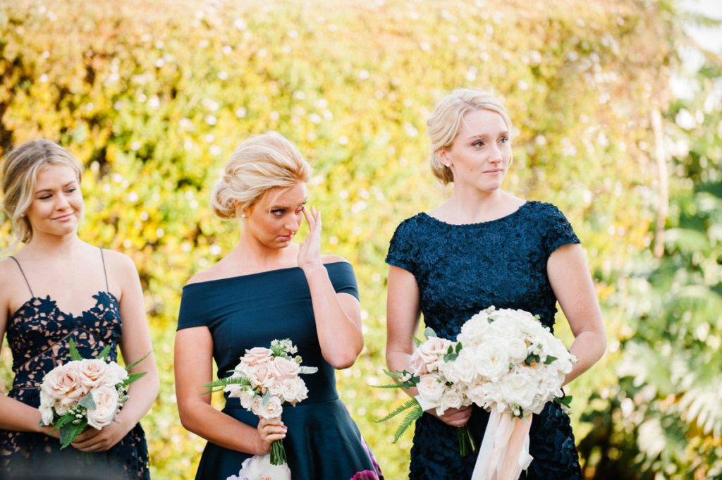 Bridesmaids get emotional during grooms vows at Cass House Grill Wedding by Austyn Elizabeth