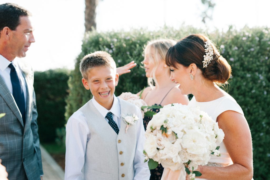 Son and Mom laugh at Cass House Wedding by Cayucos Wedding Photographer Austyn Elizabeth