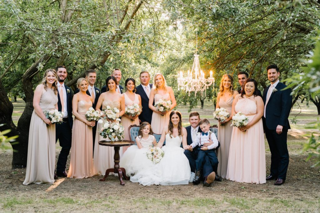 Whole bridal party in at Almond Grove Wedding by Paso Robles Wedding Photographer Austyn Elizabeth Ford