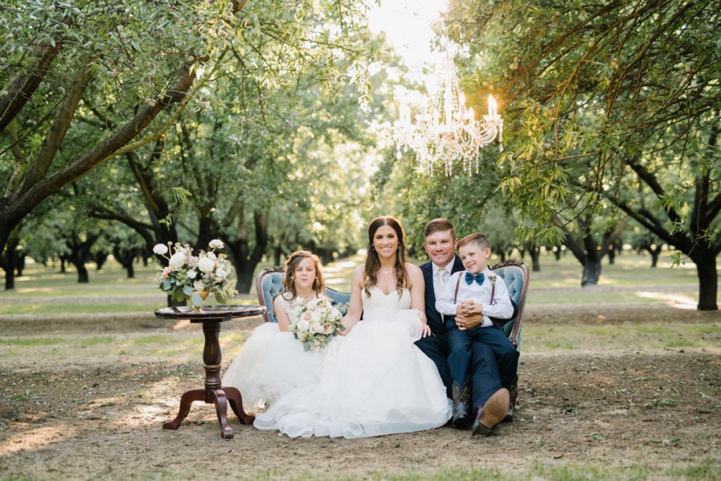 First family photos after wedding ceremony at at Almond Grove Wedding by Paso Robles Wedding Photographer Austyn Elizabeth Ford