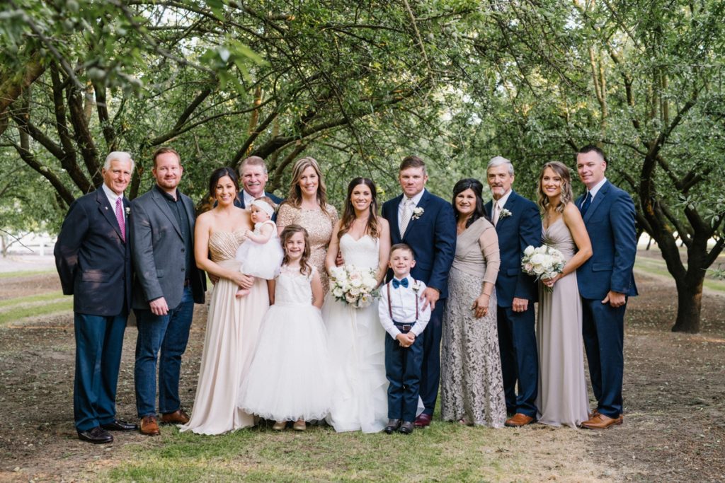 Extended family at at Almond Grove Wedding by Paso Robles Wedding Photographer Austyn Elizabeth Ford