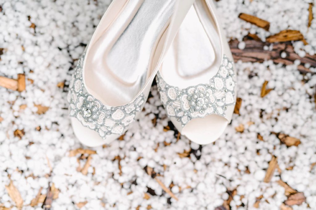 brides shoes on hail at lyons farmette wedding by san luis obispo wedding photographer austyn elizabeth photography