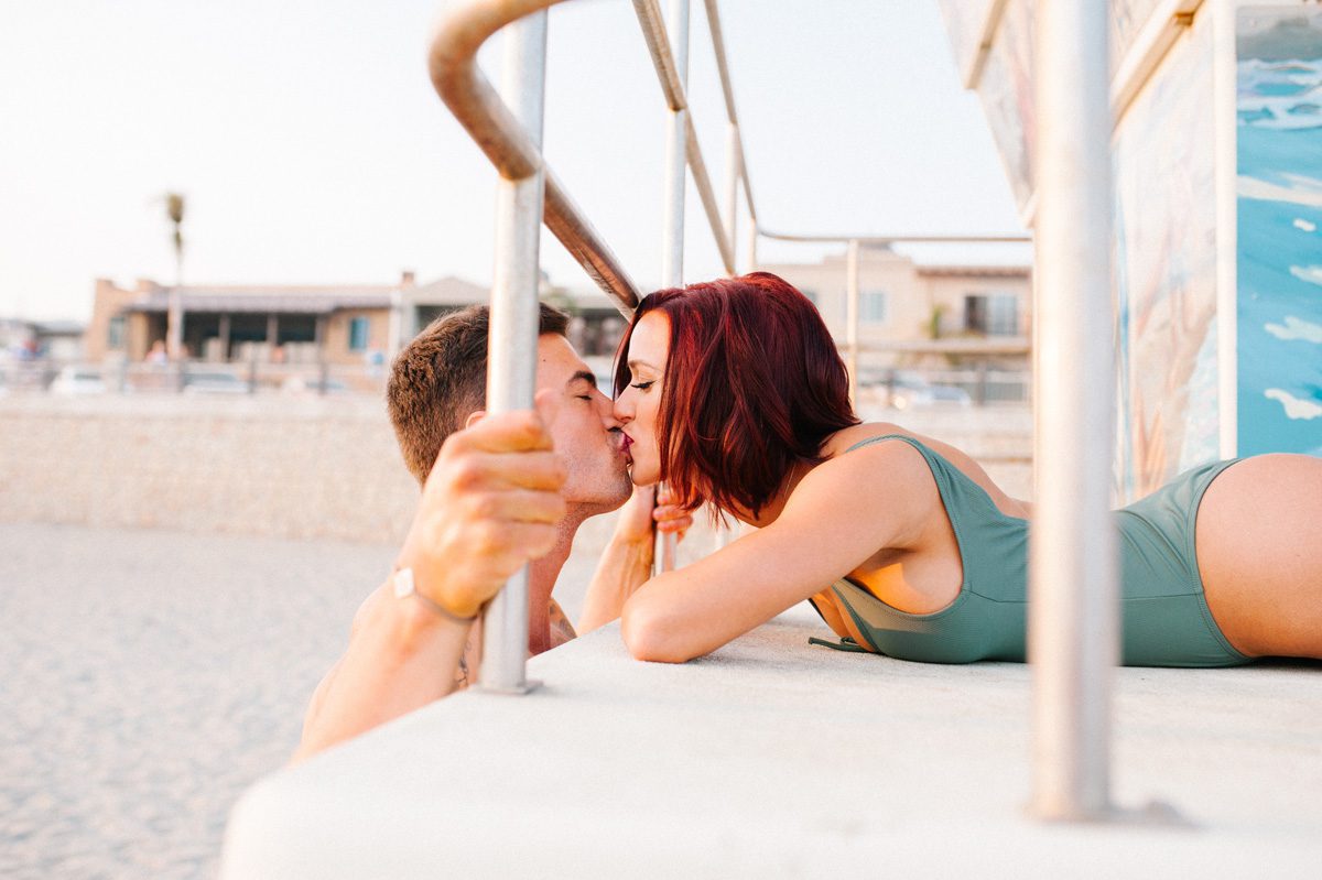Kissing on Lifeguard stand at Avila Beach by SLO Photographer Austyn Elizabeth Photography
