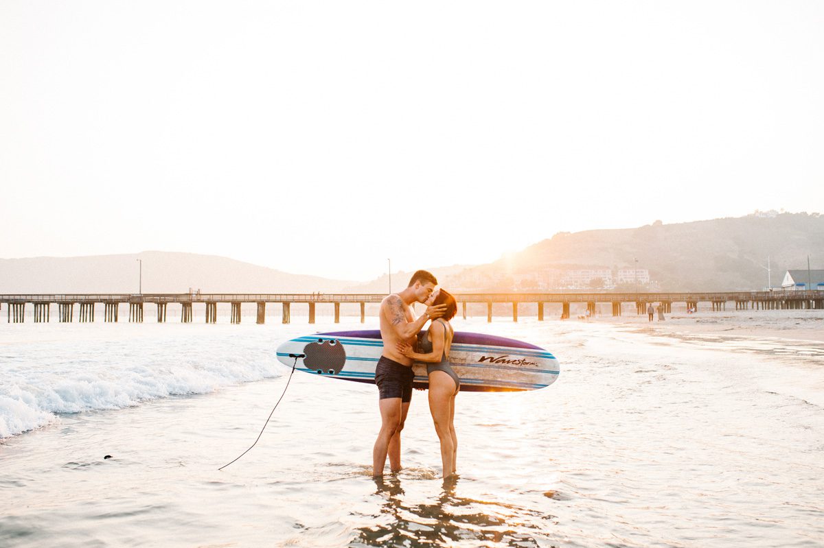 Sunset surfing engagement session in Avila Beach by Avila Portrait Photographer Austyn Elizabeth Photography