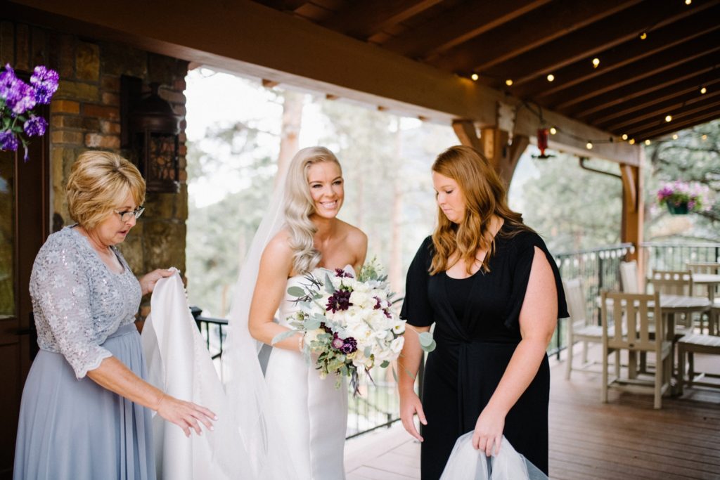 Bride smiling just before first look at Estes Park Rocky Mountain Wedding by Della Terra Wedding Photographer Austyn Elizabeth Photography