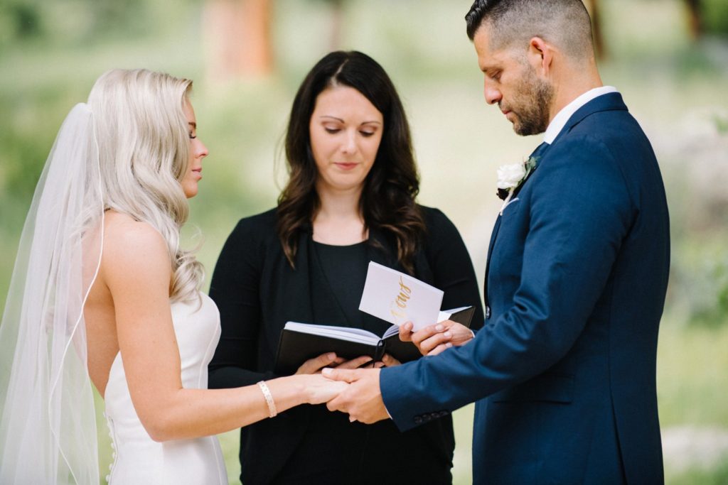 Groom saying his vows at Estes Park Wedding at Della Terra by Pismo Beach Wedding Photographer Austyn Elizabeth Photography