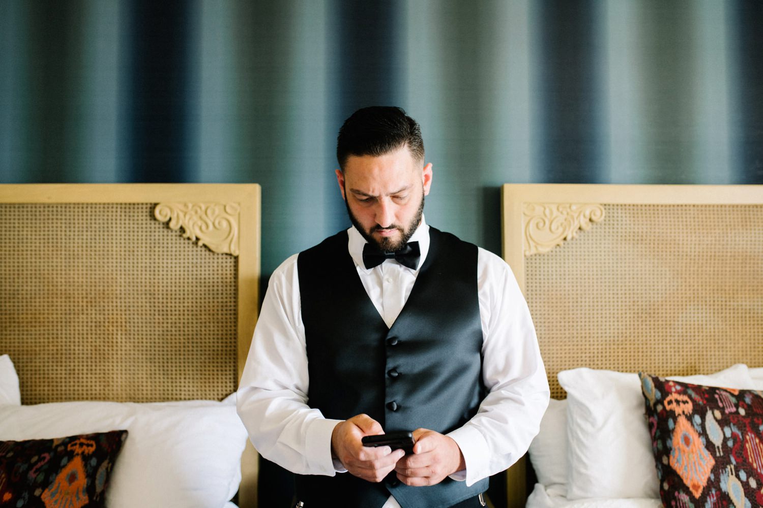 Groom getting ready at Cliffs Hotel Wedding by San Luis Obispo Wedding Photographer Austyn Elizabeth Photography
