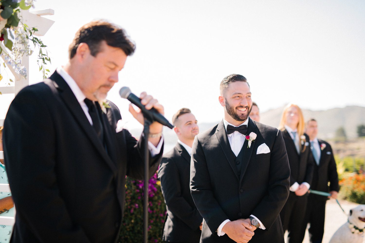 Groom smiling during ceremony at Cliffs Hotel Wedding by Central Coast Wedding Photographer Austyn Elizabeth Photography