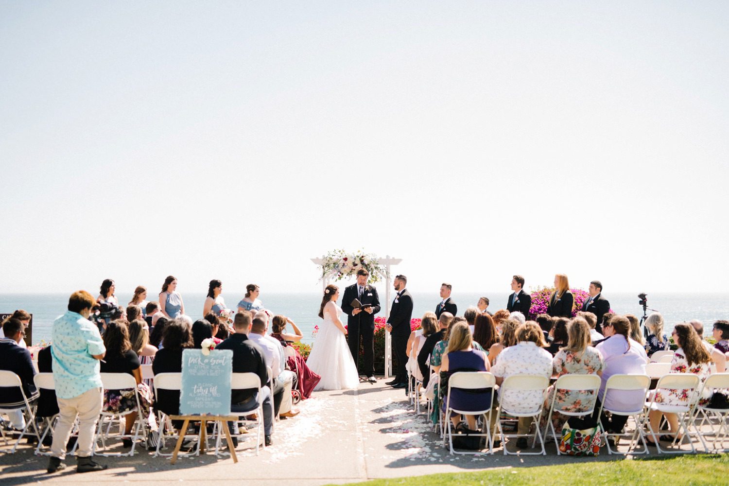 Ceremony along pismo beach cliffs at Cliffs Hotel Wedding by Arroyo Grande Wedding Photographer Austyn Elizabeth Photography