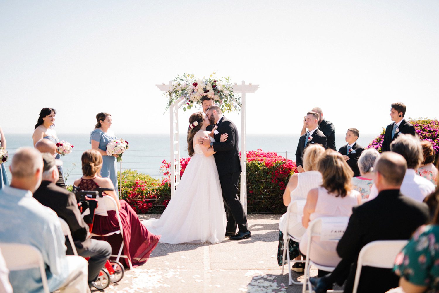 Bride and groom kiss at Cliffs Hotel Wedding by Arroyo Grande Wedding Photographer Austyn Elizabeth Photography