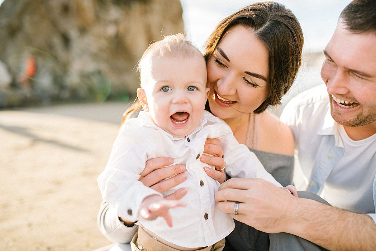 one year old in white button up yelling and smiling with Pismo Beach Family Photographer Austyn Elizabeth Photography