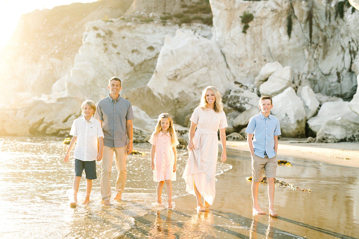 Family session in the ocean by pismo beach family photographer austyn elizabeth photography