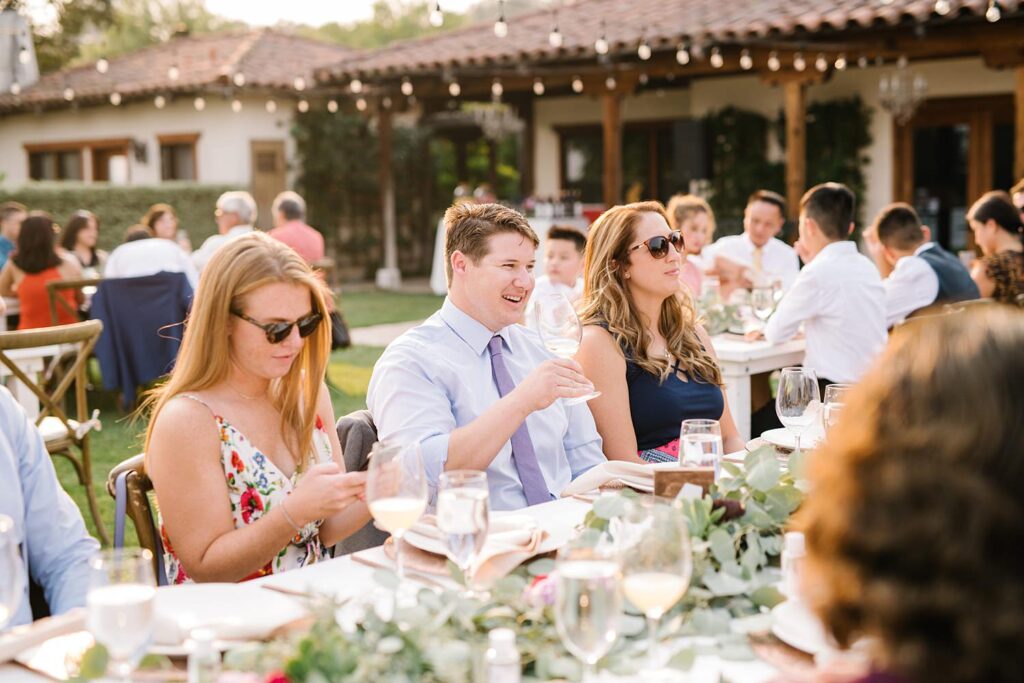 Guests enjoying dinner at The Casitas Estate Wedding by Arroyo Grande Wedding Photographer Austyn Elizabeth Photography