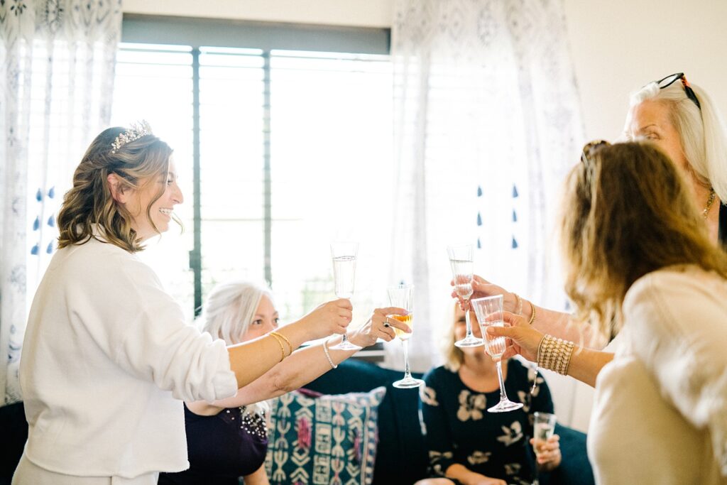 Bride and family toast together at La Lomita Ranch Wedding by SLO Wedding Photographer Austyn Elizabeth Photography