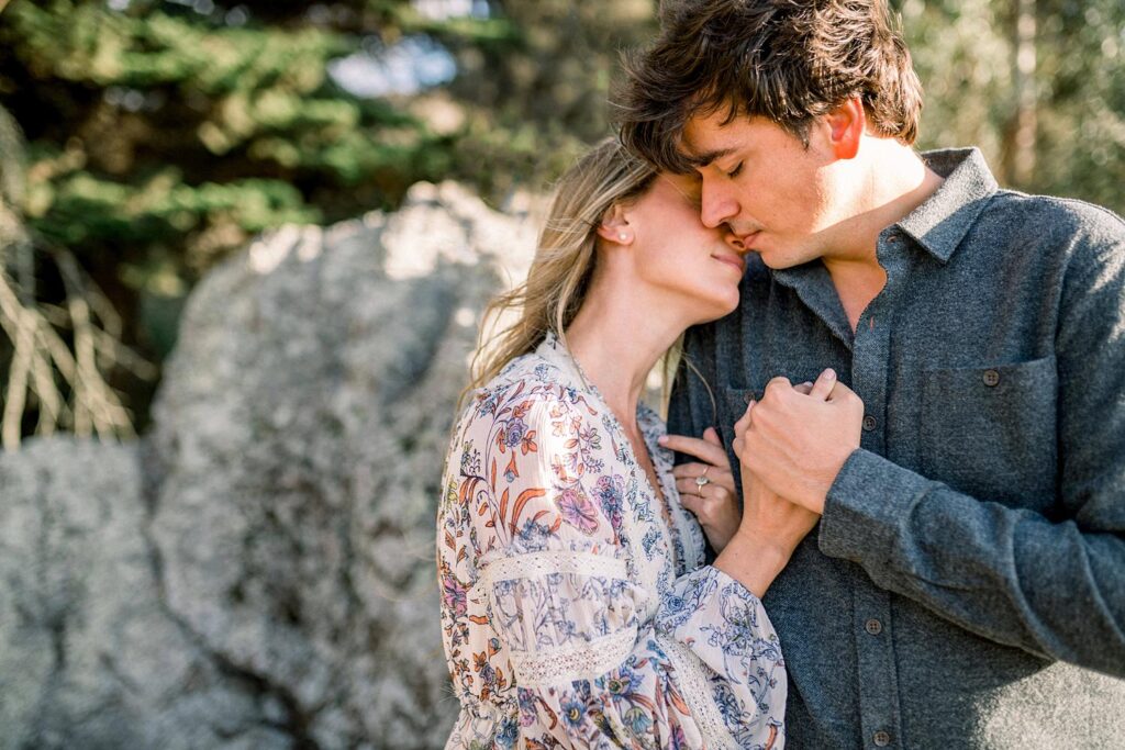 Gentle embrace with color wearing neutral colors with anthropology dress at Bishops Peak engagement session with San Luis Obispo engagement photographer Austyn Elizabeth Photography