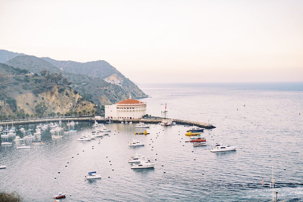 The 	Catalina casino movie theater during sunset overlooking Avalon Bay by Catalina Engagement Photographer Austyn Elizabeth Photography