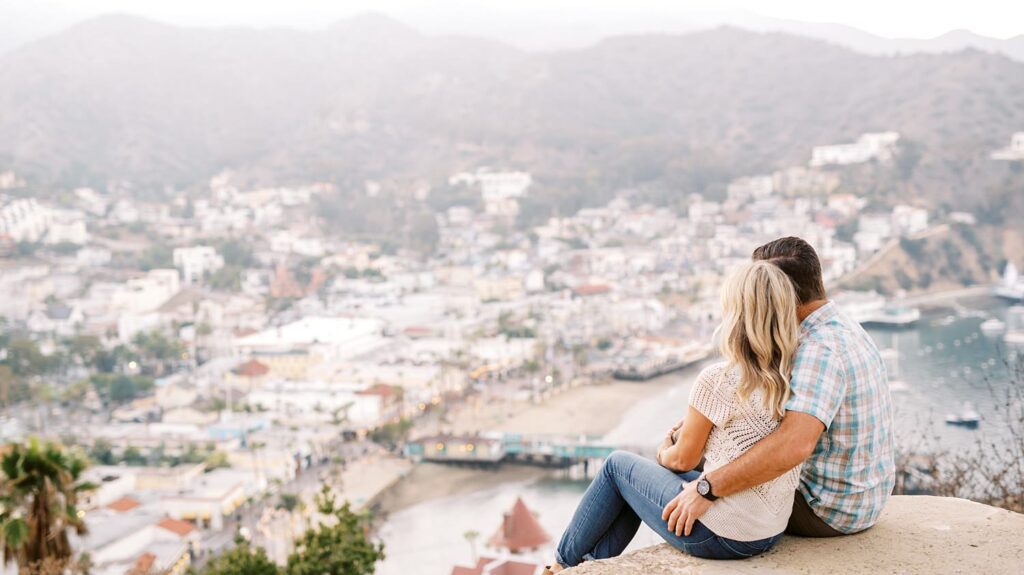 Couple overlooking Catalina Island and the small town of Avalon by Catalina Wedding Photographer Austyn Elizabeth Photography