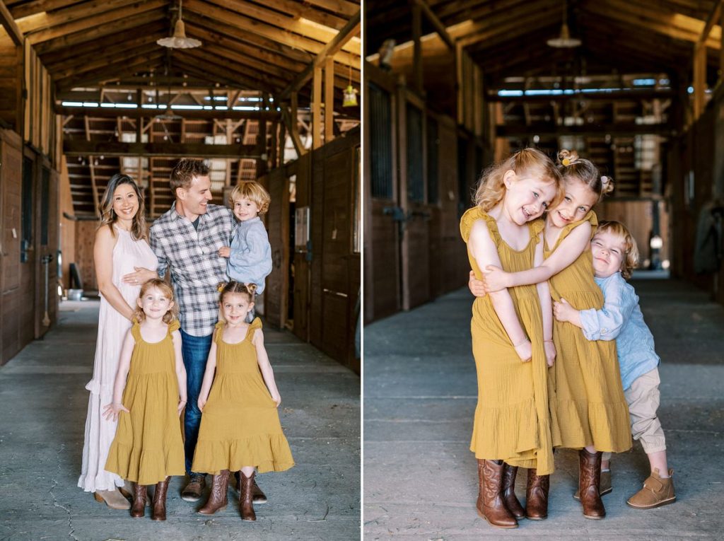 Young family embracing in horse barn at MarFarm by San Luis Obispo Family Photographer Austyn Elizabeth Photography