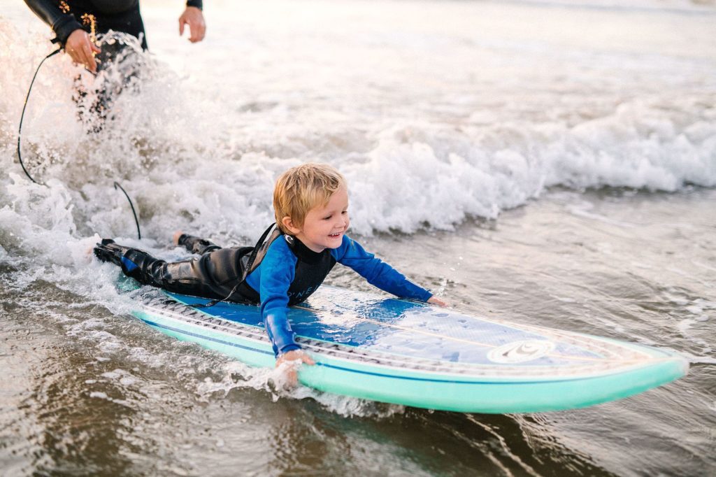 Four year old learning to surf at Pismo beach Family session by Austyn Elizabeth Photography