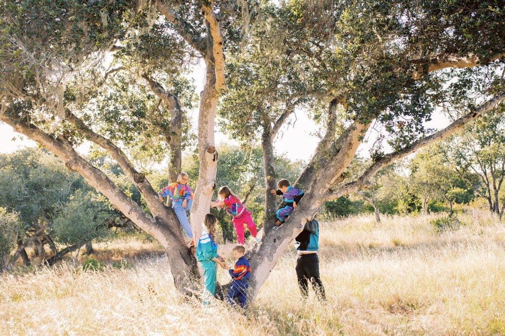 Family in retro windbreakers for family photo shoot with Pismo Beach Family Photographer Austyn Elizabeth Photography