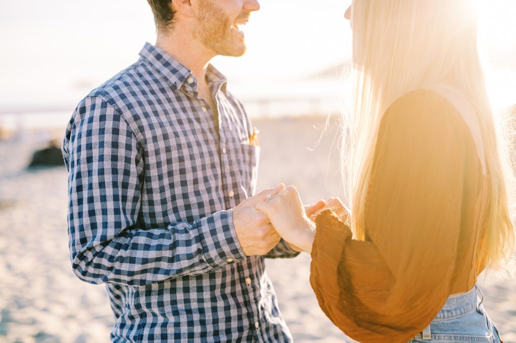 Newly engaged at sunset during Avila Beach Proposal by Pismo Beach Wedding Photographer Austyn Elizabeth Photography