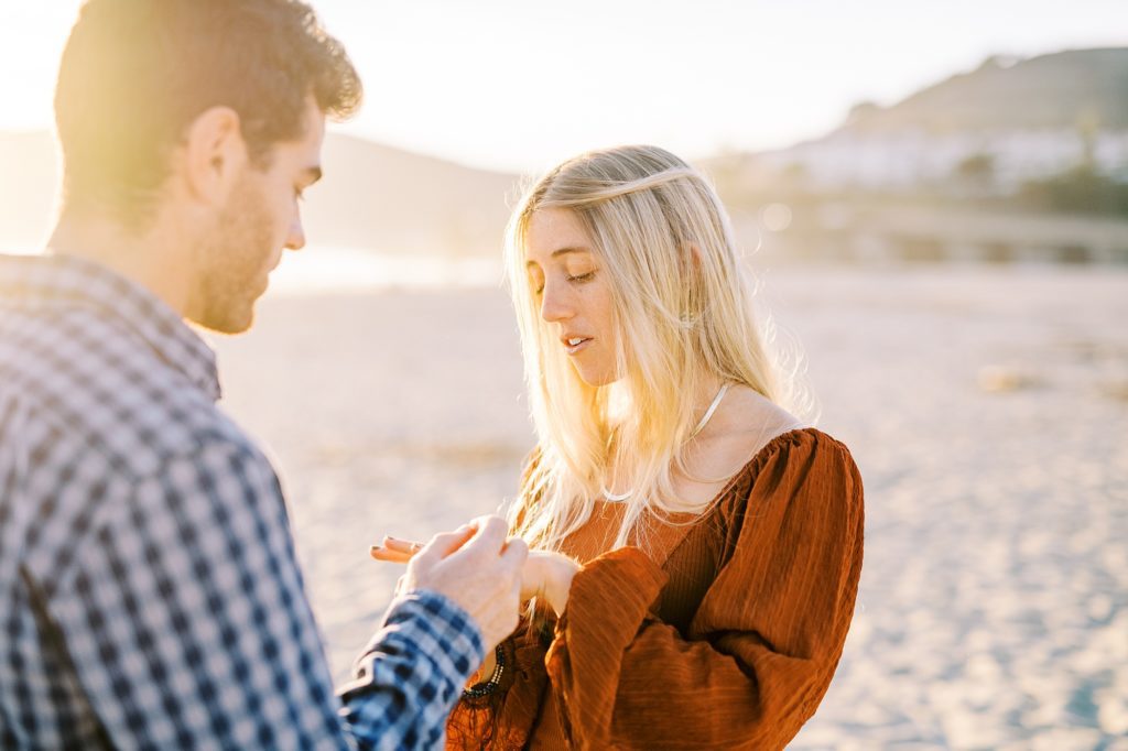 Checking out the engagement ring at Avila Beach Proposal by Avila Beach Wedding Photographer Austyn Elizabeth Photography