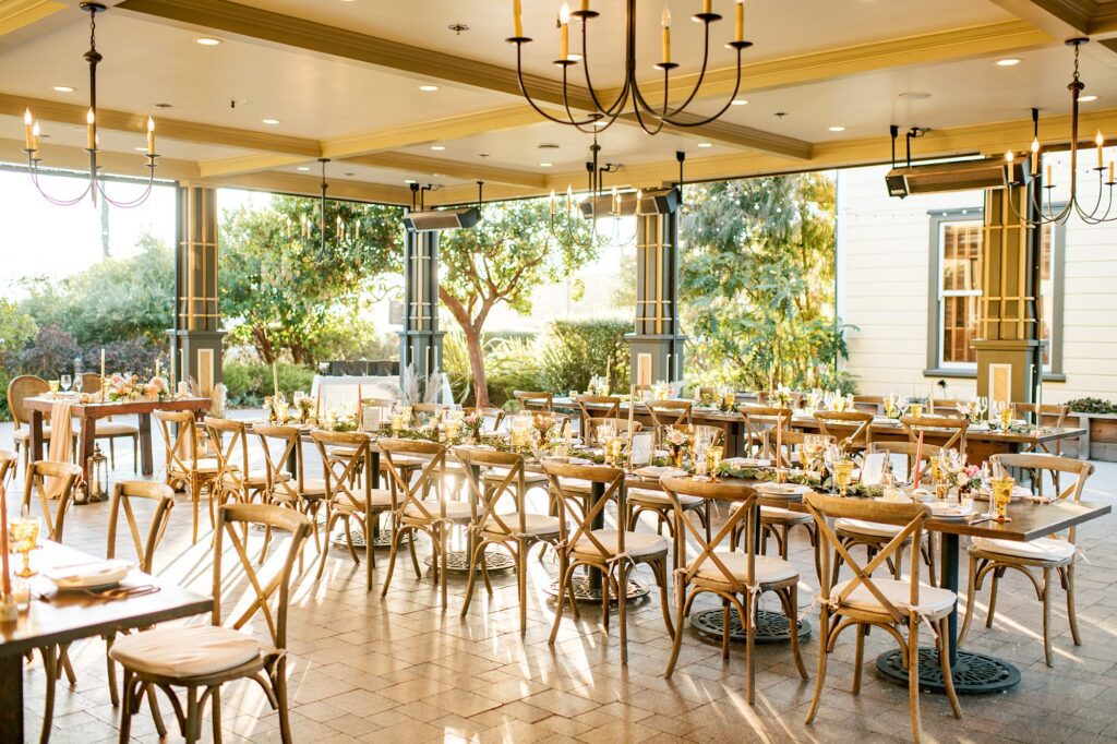 Gold and natural tones with farm house tables at California autumn coastal wedding at Cass House Cayucos Wedding by Pismo Beach Wedding Photographer Austyn Elizabeth Photography