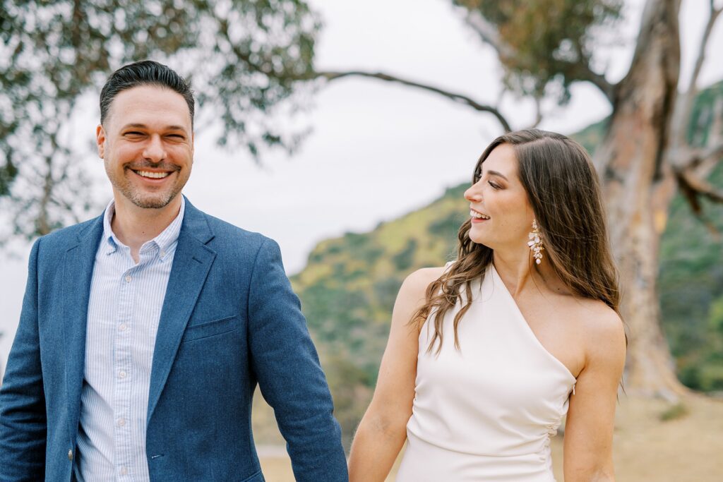 Couple walk and laugh at their Catalina island elopement in may by Catalina island elopement photographer Austyn Elizabeth Photography