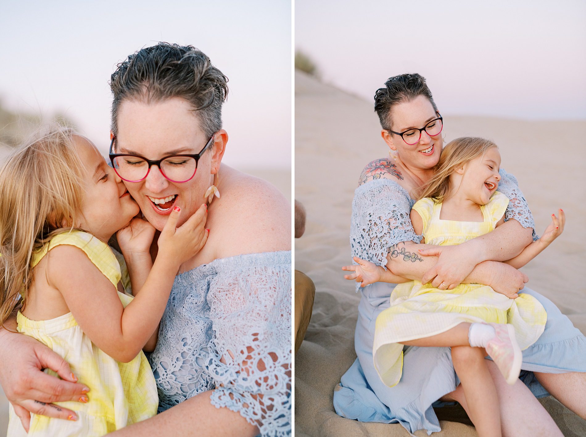 Mom in lace blue dress holding daughter in floral yellow dress at the Oceano Dunes in Pismo Beach by Pismo Beach Family Photographer Austyn Elizabeth Photography