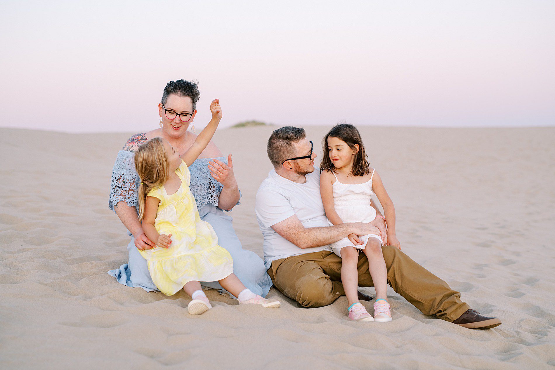 Girls interact with parents at the Oceano Dunes in Pismo Beach by Pismo Beach Family Photographer Austyn Elizabeth Photography