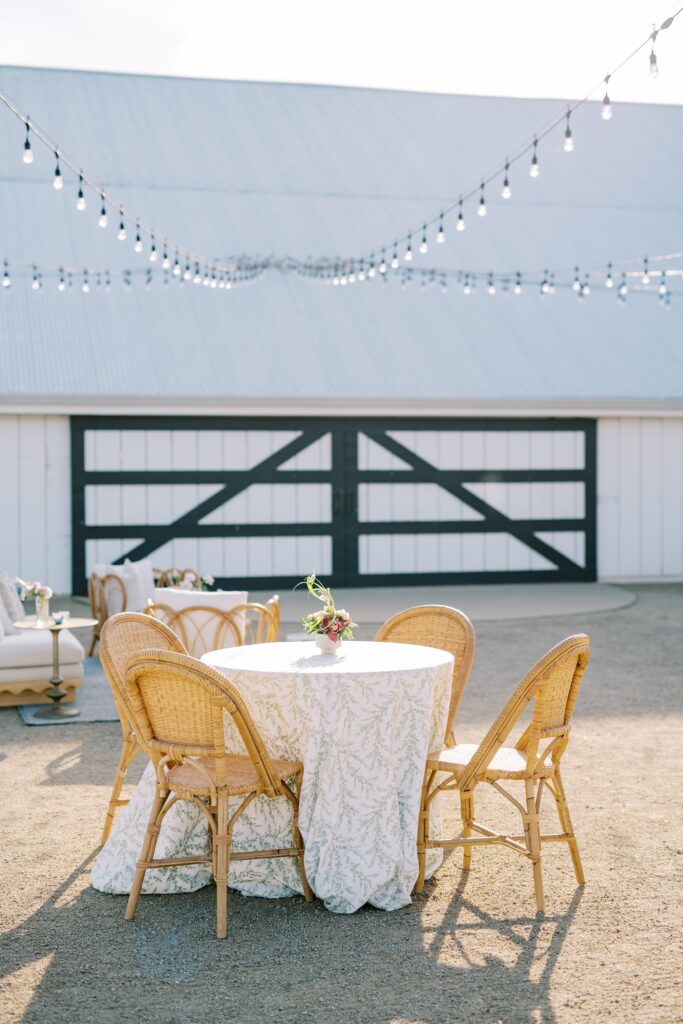 Sage and ivory fauna texture table clothes at Cal Poly's EIM event designed by Brooke Nichole Events at The White Barn by San Luis Obispo Wedding Photographer Austyn Elizabeth Photography