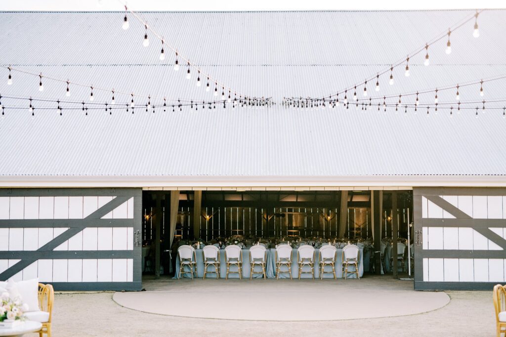 Barn doors open to see designed by Brooke Nichole Events at The White Barn by San Luis Obispo Wedding Photographer Austyn Elizabeth Photography