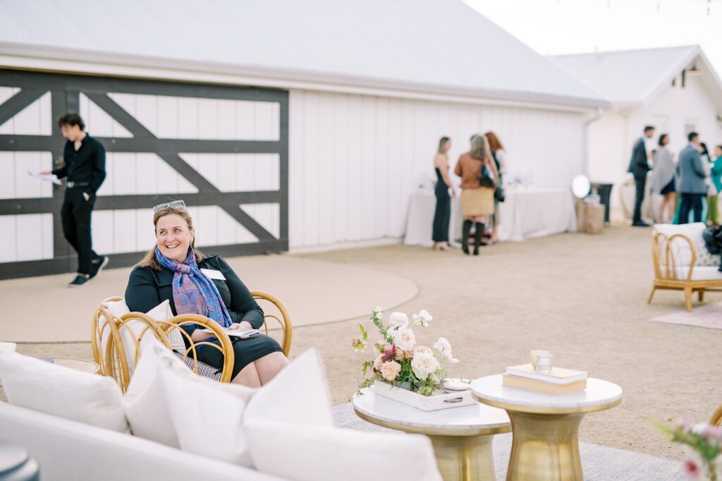 Guest lounges at Cal Poly's EIM event at The White Barn by San Luis Obispo Wedding Photographer Austyn Elizabeth Photography